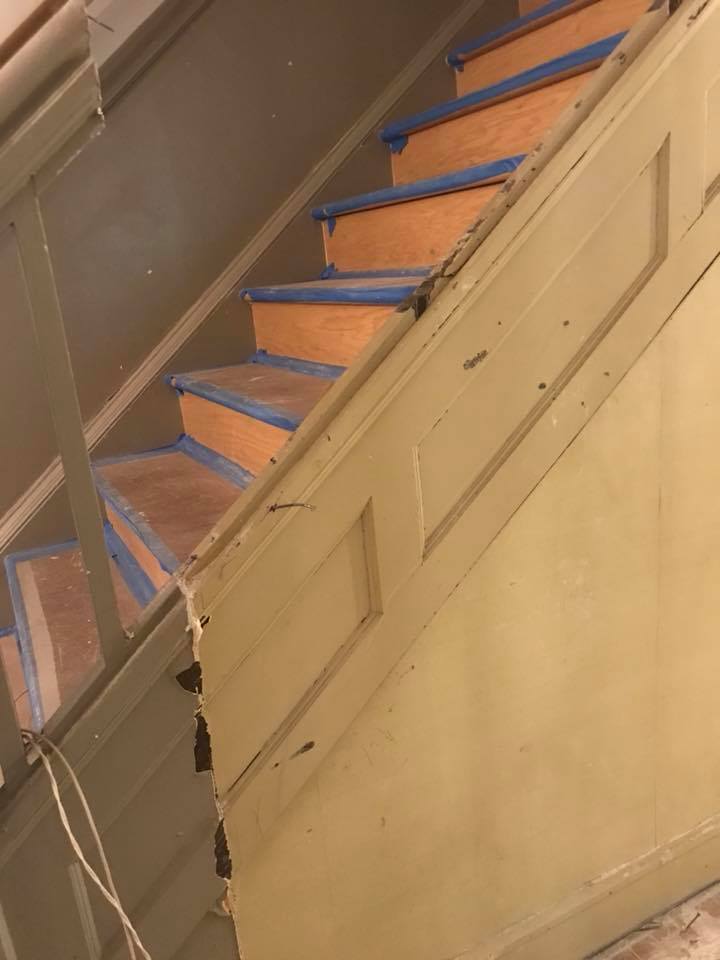 Pretty woodwork hidden behind drywall